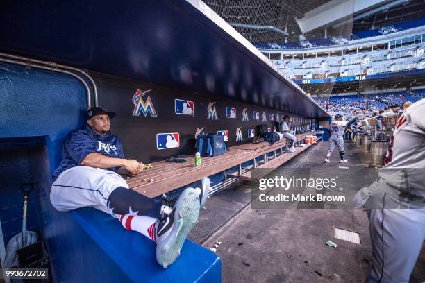 Carlos Gomez of the Tampa Bay Rays relaxing in the dugout before the game against the Miami Marlins at Marlins Park on July 3, 2018 in Miami, Florida.