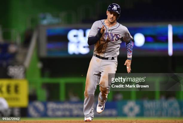Daniel Robertson of the Tampa Bay Rays runs against the Miami Marlins at Marlins Park on July 3, 2018 in Miami, Florida.