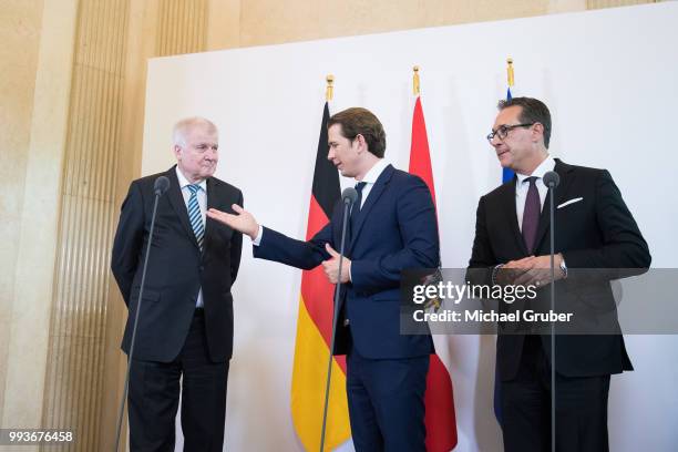 Austrian Chancellor Sebastian Kurz , German Interior Minister Horst Seehofer and Austrian Vice-Chancellor Heinz-Christian Strache speak to the media...