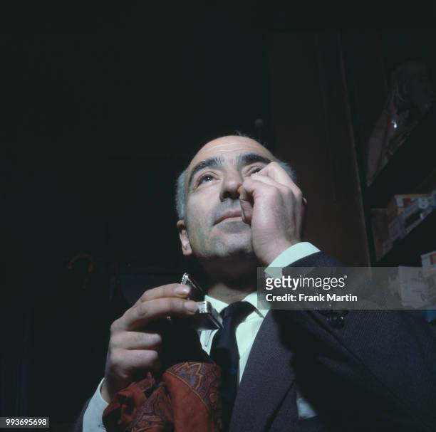 Costumer trying snuff blends at Fribourg & Treyer, London, UK, January 1965.