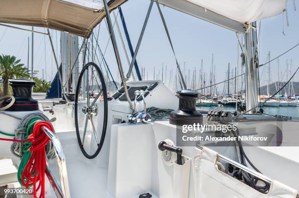 sailing catamaran helm station - catamaran sailing stock pictures, royalty-free photos & images