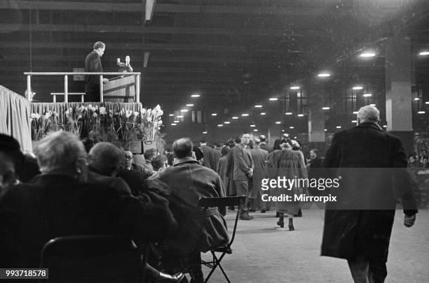 American evangelist Billy Graham addressing a huge crowd of people at Kelvin Hall in Glasgow, Scotland during his Scottish Crusade, 23rd March 1955.