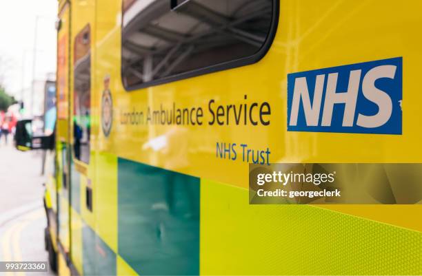 nhs ambulance in london - ambulance stock pictures, royalty-free photos & images