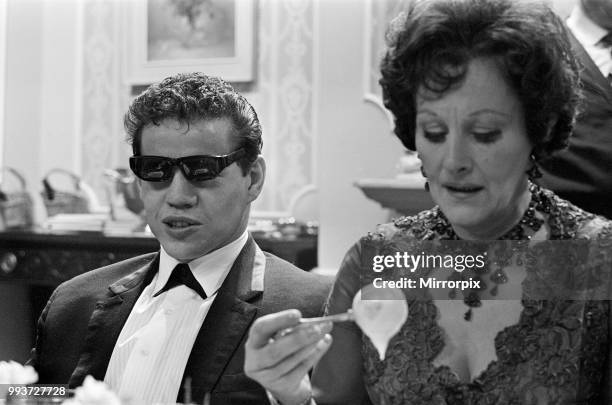 Filming on the set of the film 'Darling'. Unidentified man on the left, and Fanny Cradock on the right. Darling is a 1965 British drama film written...