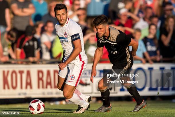 Lucian Filip of Steaua Bucharest, Klaas Jan Huntelaar of Ajax during the friendly match between Ajax Amsterdam and Steaua Bucharest on July 7, 2018...