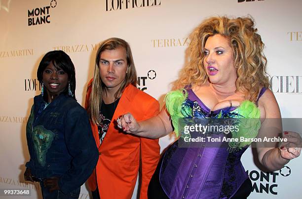 Figure skater Surya Bonaly, Designer Christophe Guillarme and Model Velvet d'Amour attend the Montblanc Party held at the Terraza Martini during the...