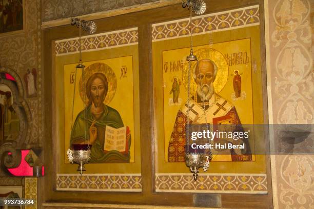 icons in st. nicholas russian orthodox church - st nicholas church stock-fotos und bilder