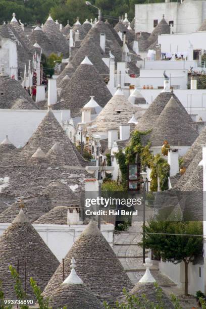trulli houses - conical roof stock pictures, royalty-free photos & images