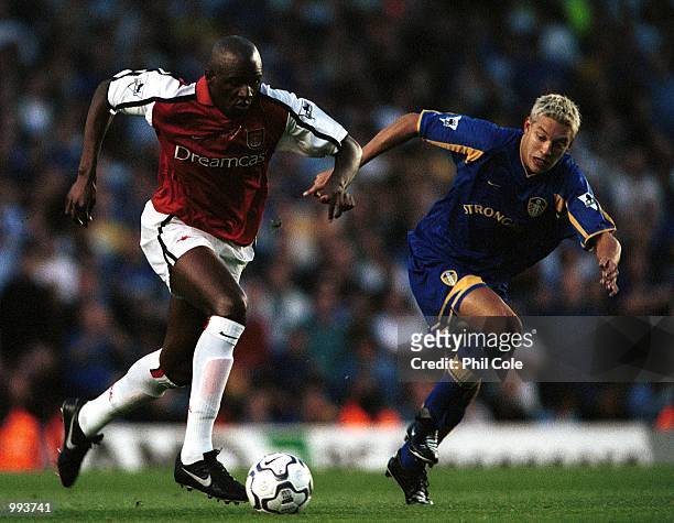 Patrick Vieira of Arsenal breaks away from Alan Smith of Leeds during the FA Barclaycard Premiership match between Arsenal and Leeds United at...