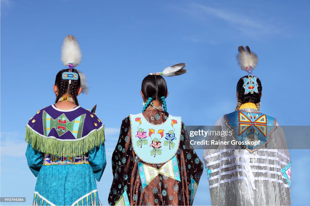 Native Americans in traditional dress at pow-wow