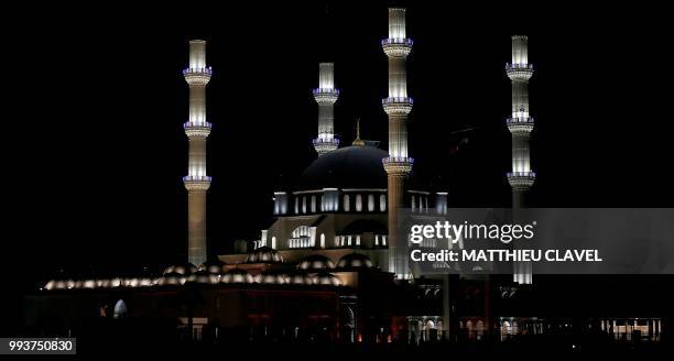 This picture shows the Hala sultan mosque in Haspolat , in the self-proclaimed Turkish Republic of Northern Cyprus , on July 7, 2018. - In the flat...