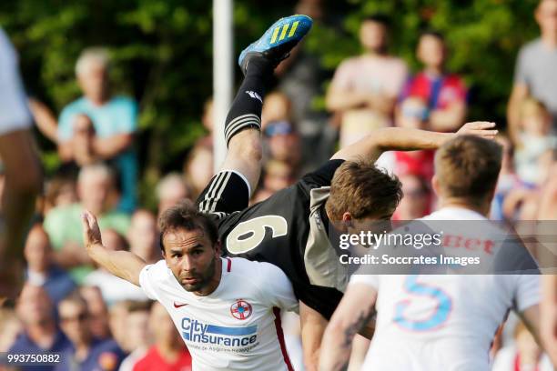 Filipe Teixeira of Steaua Bucharest, Carel Eiting of Ajax during the Club Friendly match between Ajax v Steaua Bucharest at the Sportpark 't...