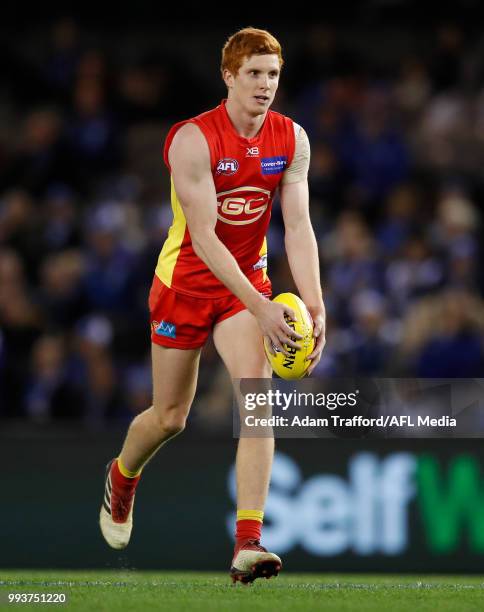 Josh Schoenfeld of the Suns lines up for goal during the 2018 AFL round 16 match between the North Melbourne Kangaroos and the Gold Coast Suns at...