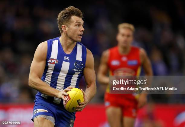 Shaun Higgins of the Kangaroos in action during the 2018 AFL round 16 match between the North Melbourne Kangaroos and the Gold Coast Suns at Etihad...