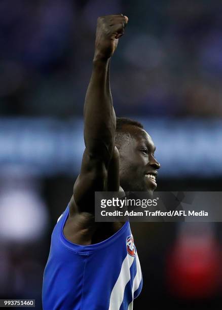 Majak Daw of the Kangaroos celebrates a goal during the 2018 AFL round 16 match between the North Melbourne Kangaroos and the Gold Coast Suns at...