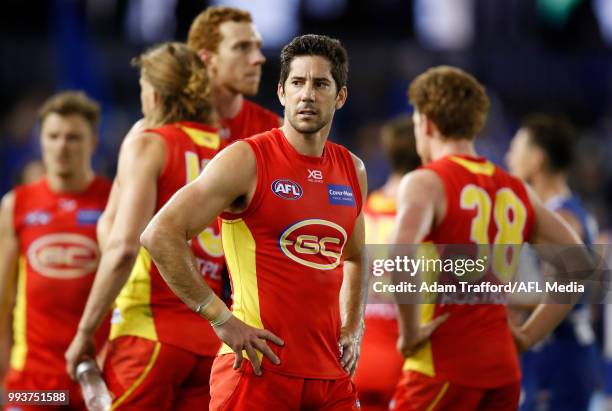 Michael Rischitelli of the Suns looks dejected after a loss during the 2018 AFL round 16 match between the North Melbourne Kangaroos and the Gold...