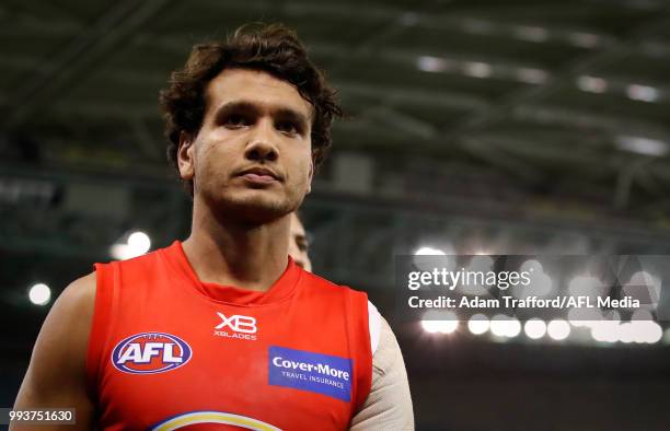 Callum Ah Chee of the Suns looks dejected after a loss during the 2018 AFL round 16 match between the North Melbourne Kangaroos and the Gold Coast...