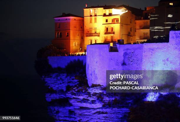 Picture taken on July 7, 2018 shows the old city of Bonifacio illuminated during the light festival 'Festi Lumi' on the French Mediterranean island...