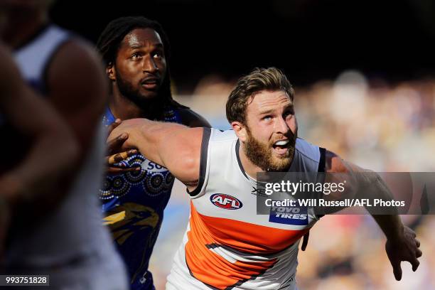 Nic Naitanui of the Eagles contests a ruck with Dawson Simpson of the Giants during the round 16 AFL match between the West Coast Eagles and the...