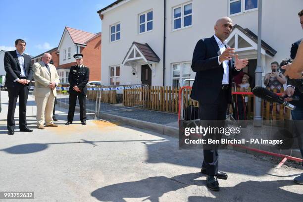 Home Secretary Sajid Javid speaks to the media at Muggleton Road in Amesbury, Wiltshire, where counter-terrorism officers are investigating after a...