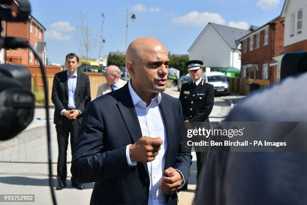 Home Secretary Sajid Javid speaks to the media at Muggleton Road in Amesbury, Wiltshire, where counter-terrorism officers are investigating after a...