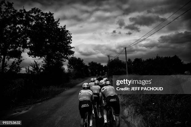 Riders of France's AG2R La Mondiale cycling team train on July 5, 2018 near Mouilleron-le-Captif, western France, two days prior to the start of the...