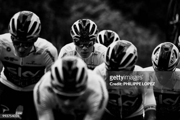 Great Britain's Christopher Froome trains with his Great Britain's Team Sky cycling team teammates on July 5, 2018 near Saint-Mars-la-Reorthe,...