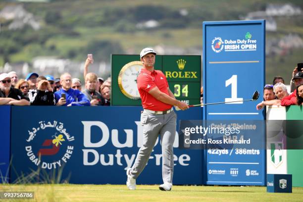 Jon Rahm of Spain tees off on the 1st hole during the final round of the Dubai Duty Free Irish Open at Ballyliffin Golf Club on July 8, 2018 in...