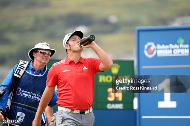 Jon Rahm of Spain has a drink on the 1st hole during the final round of the Dubai Duty Free Irish Open at Ballyliffin Golf Club on July 8, 2018 in...