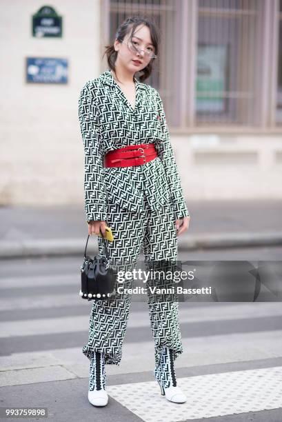 Guest poses wearing Fendi after the Fendi Couture show at the Palais Brongniart during Paris Fashion Week Haute Couture FW18 on July 4, 2018 in...