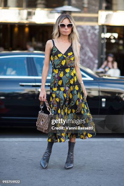 Erica Pelosini poses wearing Fendi after the Fendi Couture show at the Palais Brongniart during Paris Fashion Week Haute Couture FW18 on July 4, 2018...