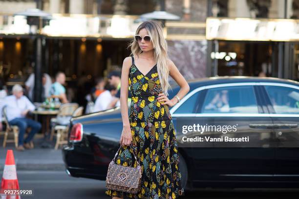 Erica Pelosini poses wearing Fendi after the Fendi Couture show at the Palais Brongniart during Paris Fashion Week Haute Couture FW18 on July 4, 2018...