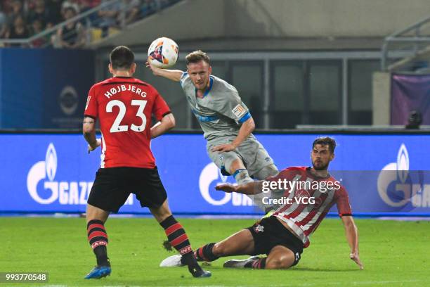 Cedric Teuchert of Schalke competes with Jack Stephens of Southampton FC during the 2018 Clubs Super Cup match between FC Schalke 04 and Southampton...