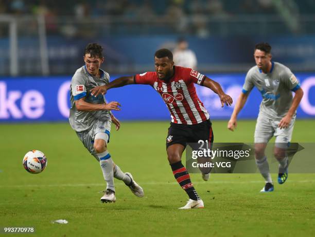 Benjamin Goller of Schalke competes with Ryan Bertrand of Southampton FC during the 2018 Clubs Super Cup match between FC Schalke 04 and Southampton...