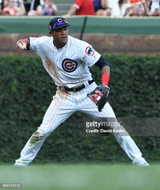 Addison Russell of the Chicago Cubs makes a play against the Detroit Tigers on July 4, 2018 at Wrigley Field in Chicago, Illinois. The Cubs won 5-2.