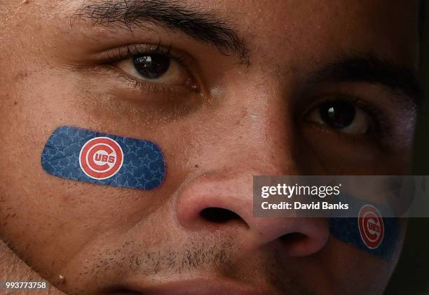 Willson Contreras of the Chicago Cubs in the dugout in a game against the Detroit Tigers on July 4, 2018 at Wrigley Field in Chicago, Illinois. The...