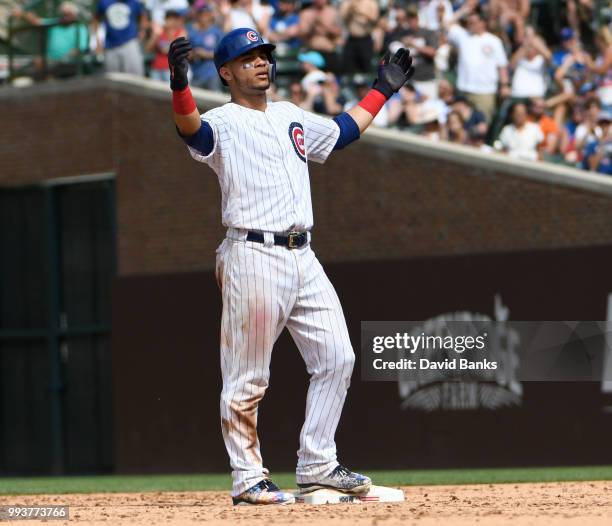 Willson Contreras of the Chicago Cubs reacts after hitting a two-RBI double against the Detroit Tigers during the seventh inning on July 4, 2018 at...