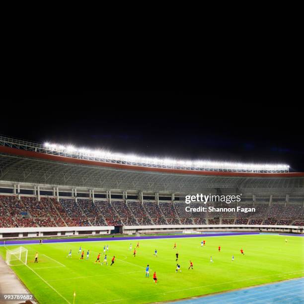 soccer game in a stadium at night - electric fan bildbanksfoton och bilder