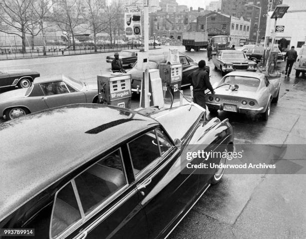View of a crowded BP service station as cars line up during a gas strike, New York, New York, May 3, 1971.