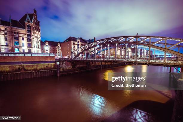 speicherstadt, steely bridge and river elbe at night, hamburg, germany - classical mythological character stock pictures, royalty-free photos & images