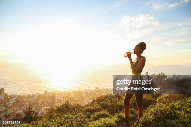trail running. - cape town sunset stock pictures, royalty-free photos & images