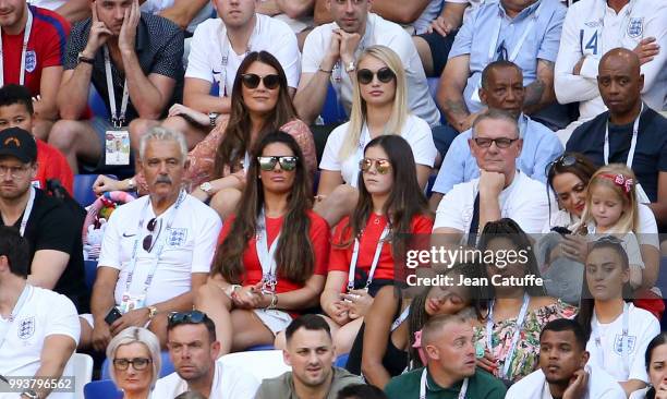 Rebekah Vardy, wife of Jamie Vardy, above Nicky Pike, wife of Ashley Young, Annabel Peyton, fiancee of Jack Butland of England attend the 2018 FIFA...