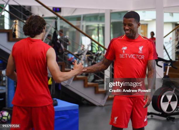 Georginio Wijnaldum with Lazar Markovic of Liverpool in the gym during his first day back at Melwood Training Ground on July 8, 2018 in Liverpool,...