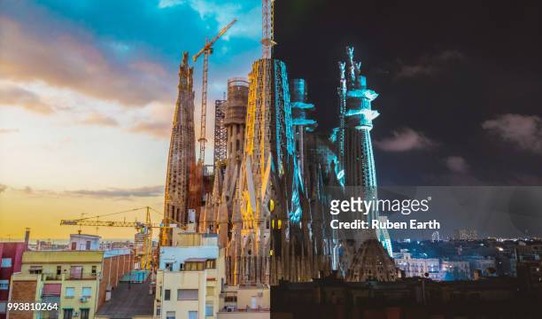 day and night split view of the sagrada familia church in barcelona - barcelona day stock pictures, royalty-free photos & images