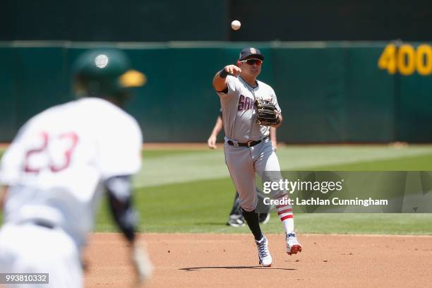 Second baseman Jose Pirela of the San Diego Padres fields a ball hit by Matt Joyce of the Oakland Athletics in the first inning at Oakland Alameda...