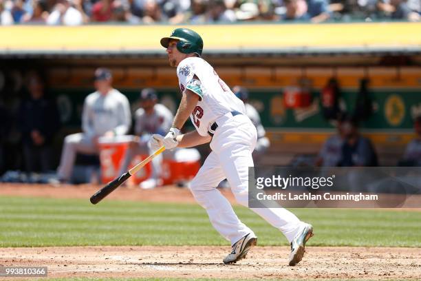 Stephen Piscotty of the Oakland Athletics hits an RBI double in the second inning against the San Diego Padres at Oakland Alameda Coliseum on July 4,...
