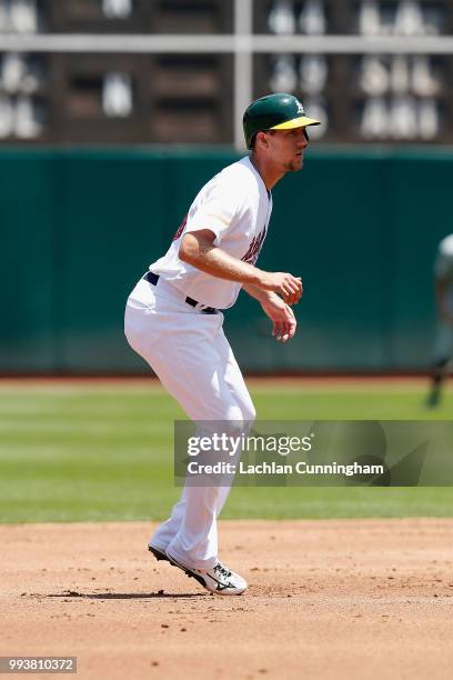 Baserunner Stephen Piscotty of the Oakland Athletics takes a lead off of second base in the second inning against the San Diego Padres at Oakland...