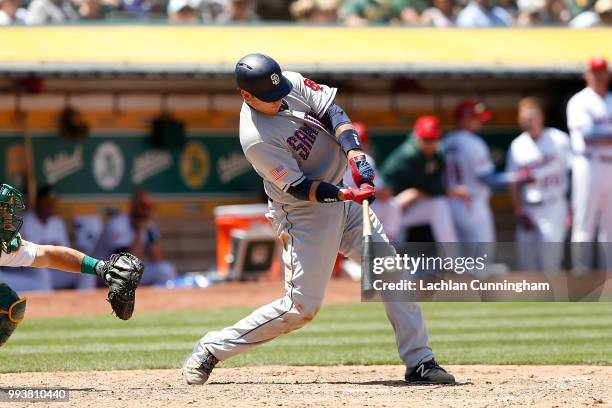 Ellis of the San Diego Padres at bat in the seventh inning against the Oakland Athletics at Oakland Alameda Coliseum on July 4, 2018 in Oakland,...