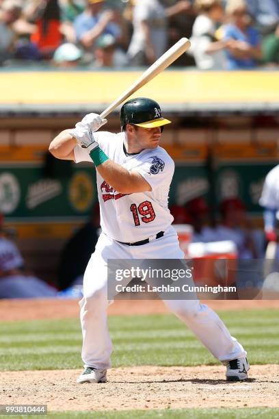 Josh Phegley of the Oakland Athletics at bat in the seventh inning against the San Diego Padres at Oakland Alameda Coliseum on July 4, 2018 in...
