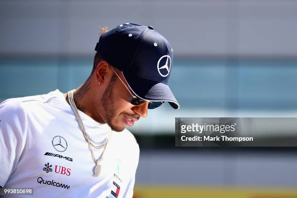Lewis Hamilton of Great Britain and Mercedes GP on the drivers parade before the Formula One Grand Prix of Great Britain at Silverstone on July 8,...
